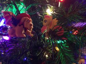 Two toys on the tree.