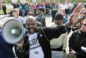 Hutcherson and his bullhorn harassing gay students and their parents.