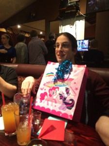 Jared with a present and two Mai Tais.