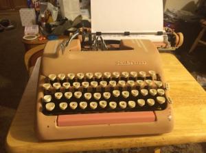A Smith-Corona Silent-Super typewriter in the Easter Pink color scheme, virtually identical to my Mom's former typewriter, the one I learned to type on.