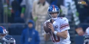 Watch Eli Manning throw the ghost football again and again and again...