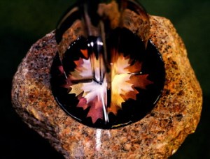 A look at the awesome base of the 2009 Hugo trophy. When I said in the other caption that I'd touched this one, I don't just mean one of the trophies from this year, I mean this exact one, because the designer and I were on the staff of a small local convention the year he did this.