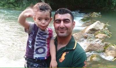 This is Adel Termos pictured with one of his children. Mr. Termos sacrificed himself by tackling a suicide bomber in Beirut on Thursday.
