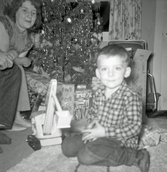 Christmas at my Grandma's, age 4. There are a surprising number of picture of me with that Tonka steam shovel in later years.