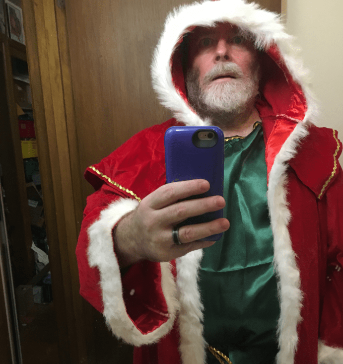 Me trying the costume before the Halloween Party. For Christmas I had a black belt and wore my round gold-rimmed glasses.