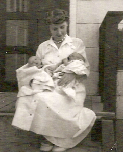 Grandma with myself and my almost-twin cousin.