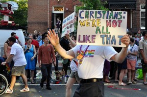 Protestors and counter protestors at a gay pride parade. © Patrick Carlson (https://www.flickr.com/photos/48018335@N06/)