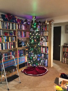 Our artificial tree is almost as tall as the ceilings in the new house. Here was a midway point in the process... © 2017 Gene Breshears