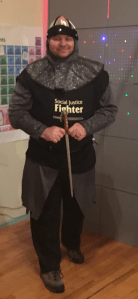 He is my knight in shining armor... even when the armor includes a t-shirt that says “Social Justice Fighter.”