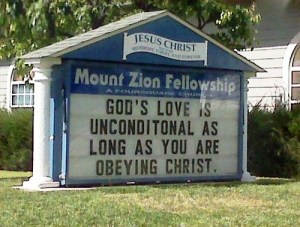Church sign reads: “God's love is unconditional as long as you are obeying Christ.”