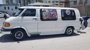 One of many photos of the van owned by the bombing suspect. It is covered in racist, misogynist, pro-Trump stickers, including my images of prominent Democrats with gun sight crosshairs superimposed.