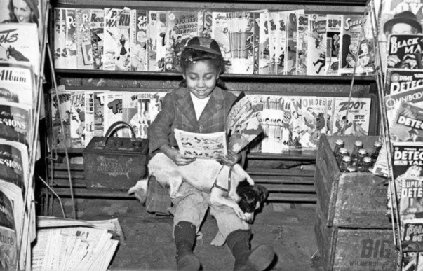 Look at this African-American girl gleefully reading comic books in the 1940s...