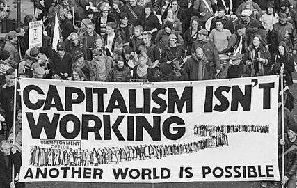 Historical photo depicting a crowd a protestors during the Great Depression holding a sign that reads “Capitalism isn't working. Another world is possible.”
