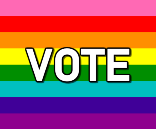 “Vote” in bold letters in front of a rainbow flag.