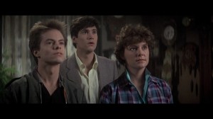 Movie still: (l to r) "Evil Ed", Charley, and Amy, as portrayed by Stephen Geoffreys, William Ragsdale, and Amanda Bearse.